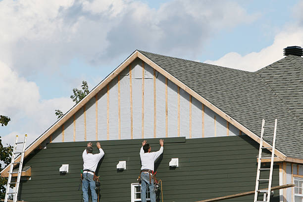Professional Siding Installation technician working in Adamstown, PA
